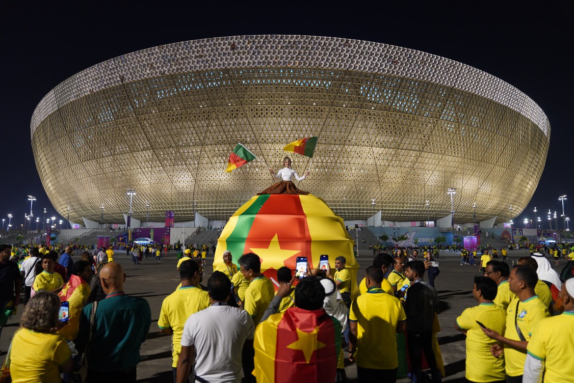 Brazil fans celebrate outside the stadium
