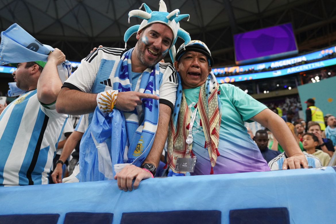 Argentina fans celebrate in the stands before the match.