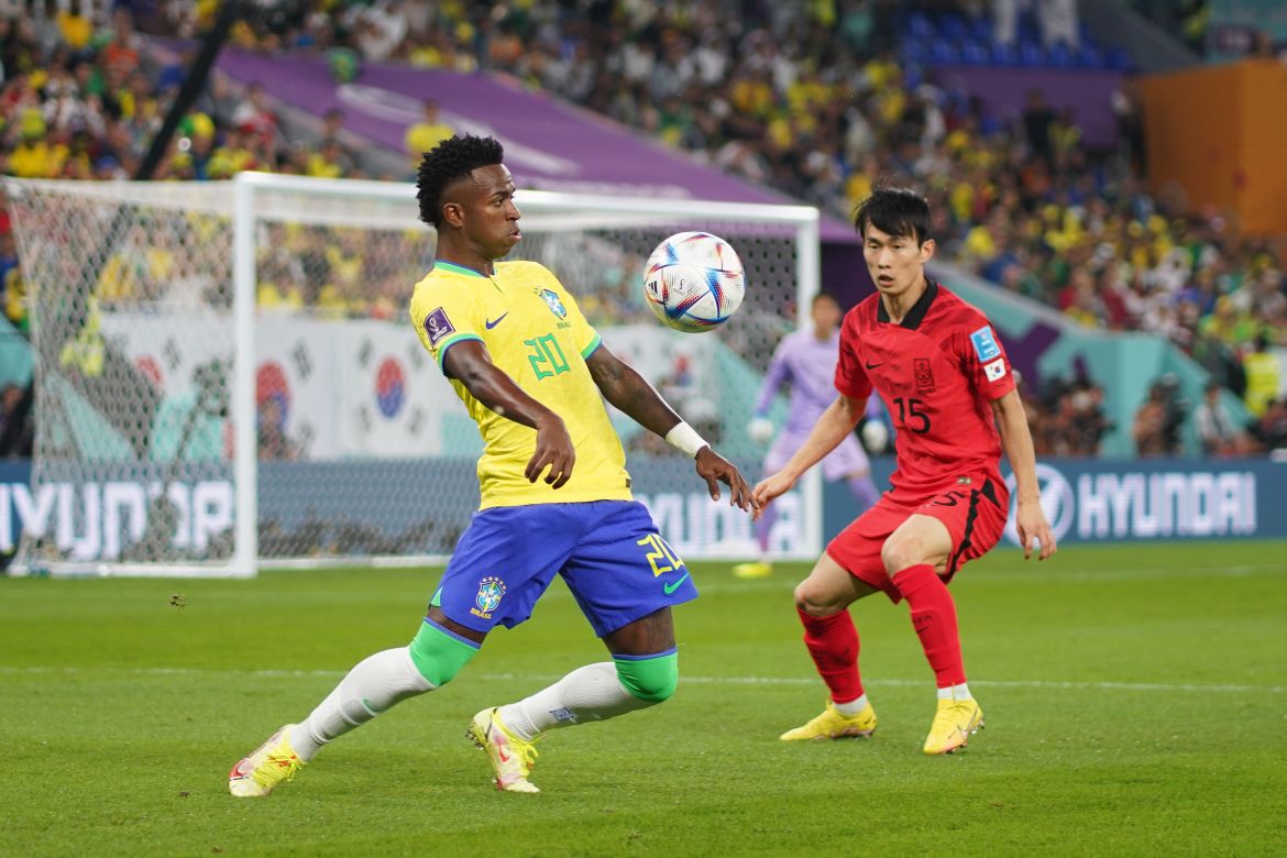 Vinicius Junior handles the ball in front of a South Korean defender.