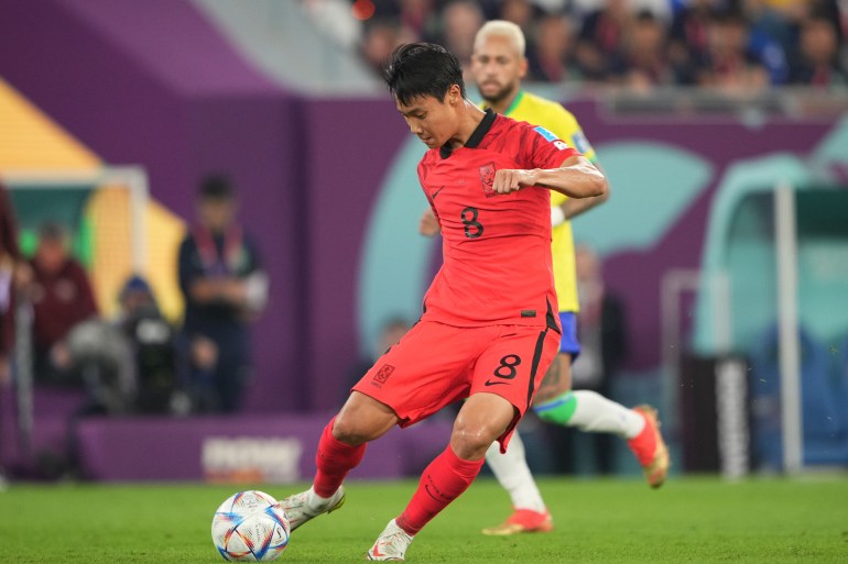 Paik Seung-ho has another go at the ball for the Korean team.