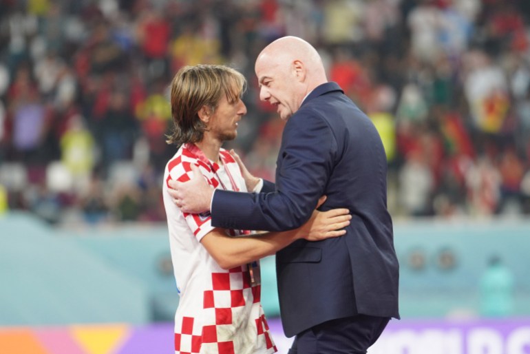 Modric receives bronze medal from Infantino