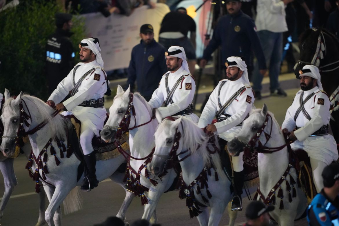 Qatari police on horseback also took part in the Argentinian team's victory parade.