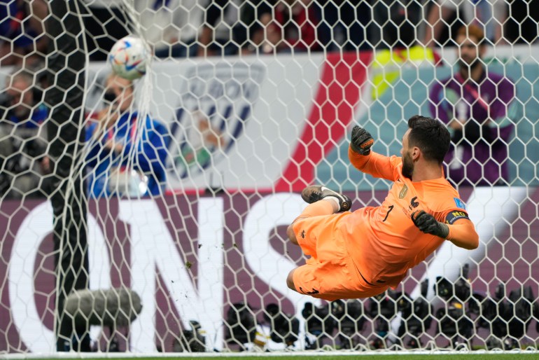 France keeper Hugo Lloris watches the ball hit the back of the net as he is unable to stop Harry Kane's penalty attempt.