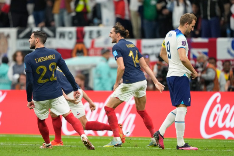 French players celebrate as Harry Kane misses penalty