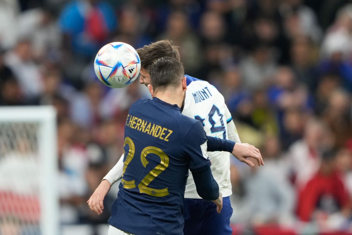 Theo Hernandez #22 in action with Mason Mount #19