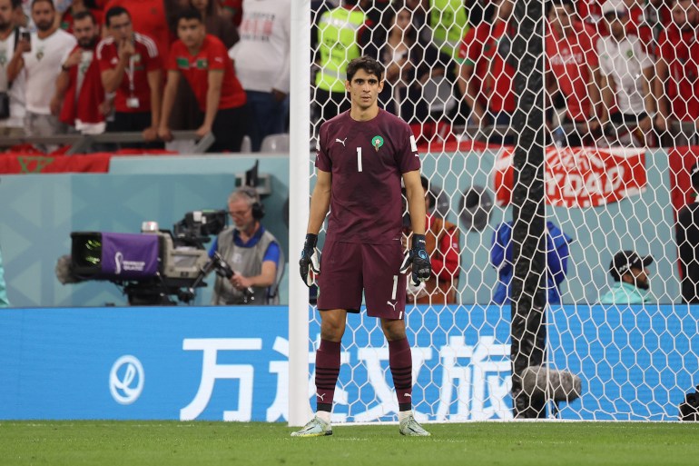 Morocco goalkeeper Yassine Bounou standing in front of his net.