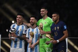 Lionel Messi Emiliano Martinez Kylian Mbappe hoisting the award | Argentina v France, FIFA World Cup 2022 Final, December 18, Lusail Stadium