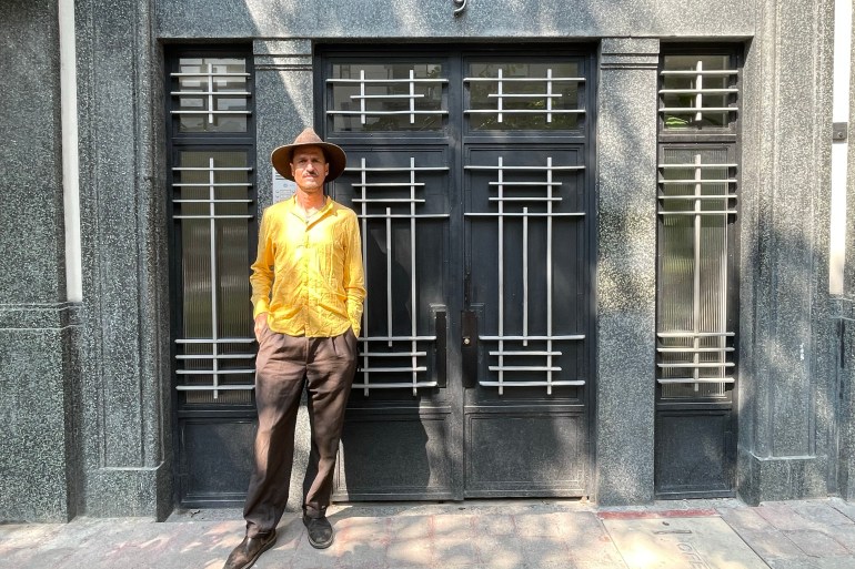 Sergio Gonzalez in front of the building he was evicted from 