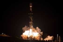A SpaceX rocket carrying the Surface Water and Ocean Topography satellite lifts off from Vandenberg Space Force Base in California