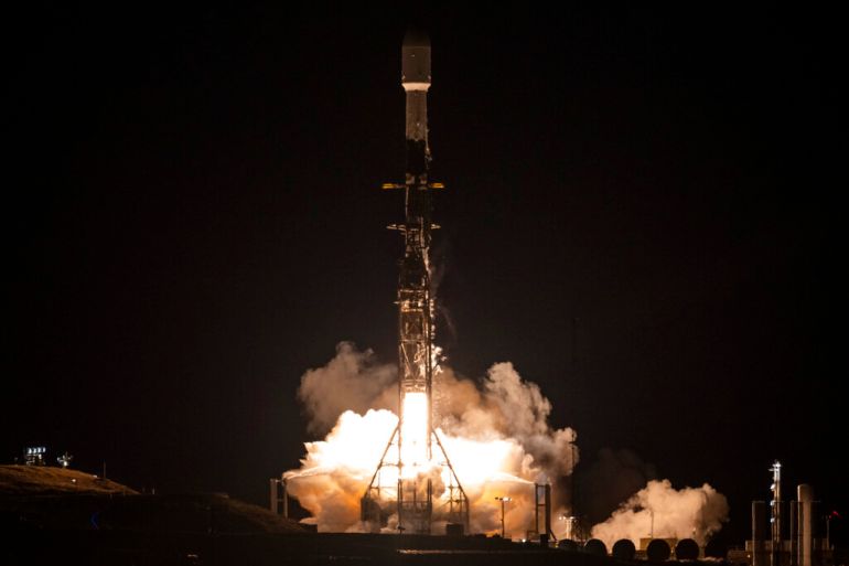 A SpaceX rocket carrying the Surface Water and Ocean Topography satellite lifts off from Vandenberg Space Force Base in California