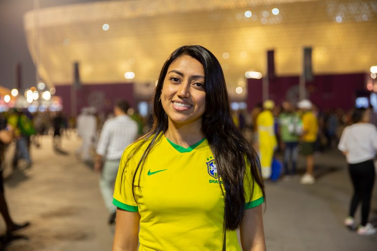 Tatiana Lopez, a Colombian fan of the Brazilian team, out late at night in Doha. (Hafsa Adil/Al Jazeera)