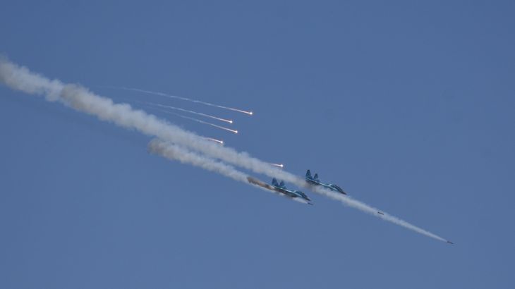 Two Myanmar military jets fire missiles during combined exercise by Myanmar army and air force near Magway in January 2019