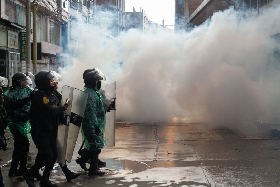 Riot police clash with anti-government protesters