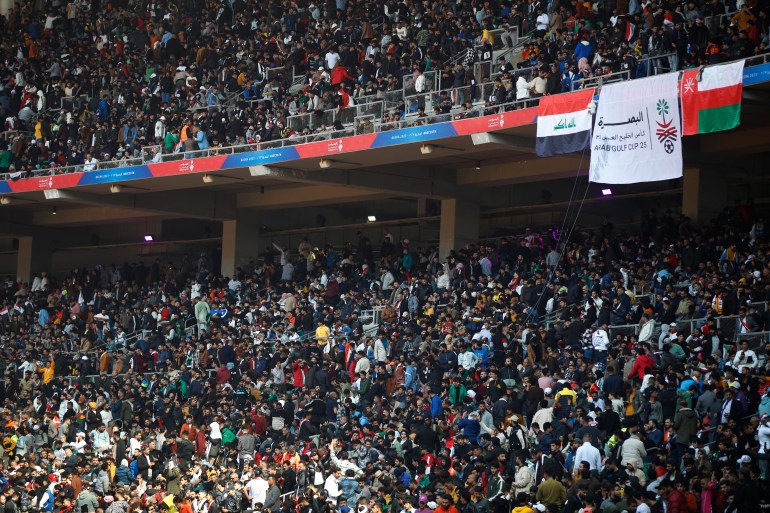 Football fans take their seats early in the day for the evening's final match of the Arabian Gulf Cup