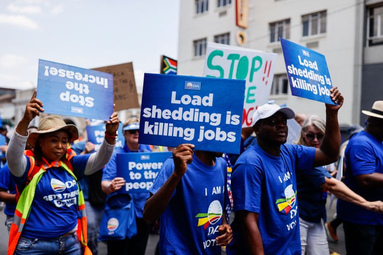 Democratic Alliance (DA) members protest power cuts in South Africa