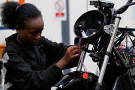 A worker at ARC Ride assembles an electric motorcycle at the company's warehouse in Industrial Area, Nairobi, Kenya November 2, 2022. REUTERS/Monicah Mwangi