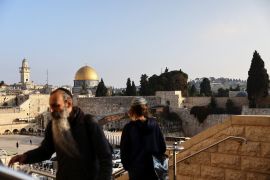 Jews walk up and down the stairs opposite to the Western Wall, Judaism's holiest prayer site, and near the compound known to Muslims as Noble Sanctuary