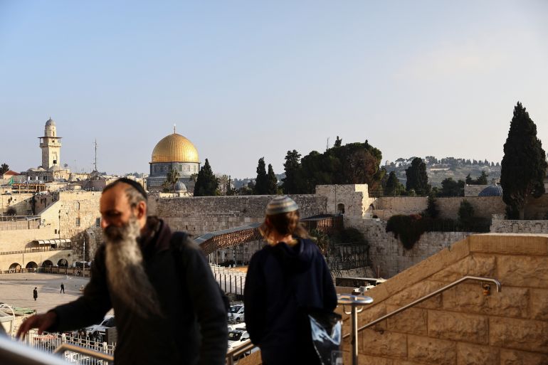 Jews walk up and down the stairs opposite to the Western Wall, Judaism's holiest prayer site, and near the compound known to Muslims as Noble Sanctuary