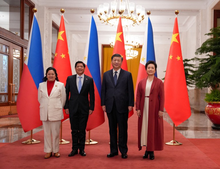 Philippines' President Ferdinand "Bongbong" Marcos Jr and First Lady Liza Araneta Marcos are photographed with China President Xi Jinping and his wife Peng Li Yuan during a welcoming ceremony at the Great Hall of the People in Beijing, China.