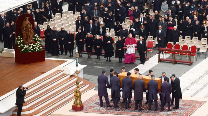 The coffin of former Pope Benedict is carried during his funeral, in St. Peter's Square at the Vatican, January 5, 2023. REUTERS/Guglielmo Mangiapa