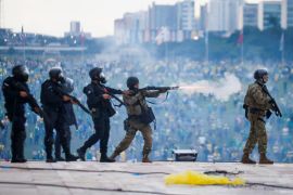 Security forces operate as supporters of Brazil's former President Jair Bolsonaro demonstrate against President Luiz Inacio Lula da Silva