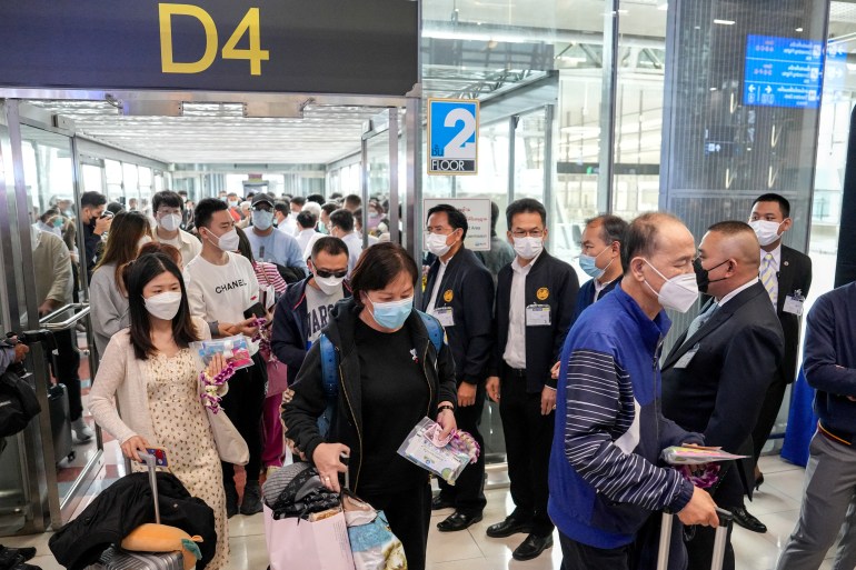 Passengers from China's Xiamen arrive at Bangkok’s Suvarnabhumi airport after China reopens its borders amid the coronavirus disease (COVID-19) pandemic, in Bangkok, Thailand, January 9, 2023