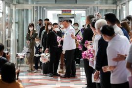 Thailand’s Health minister Anutin Charnvirakul welcomes plane passengers from China’s Xiamen, as they arrive at Bangkok’s Suvarnabhumi airport after China reopens its borders amid the coronavirus disease (COVID-19) pandemic, in Bangkok, Thailand, January 9, 2023.
