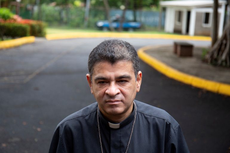 Catholic Bishop Rolando Alvarez standing in a street.