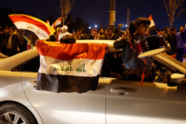 raq fans celebrate after winning the Arabian Gulf Cup25 Final REUTERS/Khalid Al-Mousily