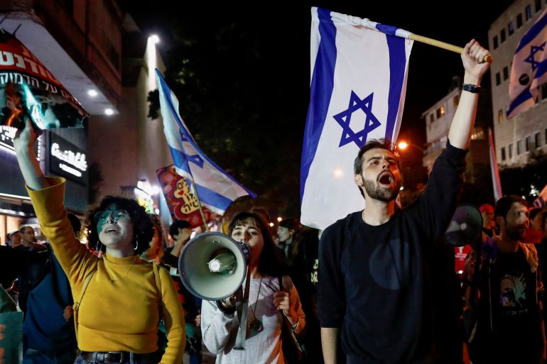 Israelis protest against Prime Minister Benjamin Netanyahu's new right-wing coalition and its proposed judicial reforms to reduce powers of the Supreme Court, in Tel Aviv, Israel January 21, 2023. REUTERS/Corinna Kern
