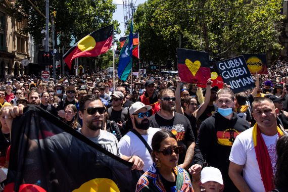 People participate in the 'Invasion Day' rally in Melbourne, January 26, 2023.