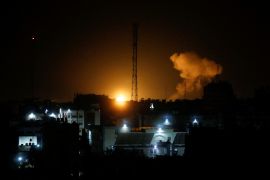 Smoke and flames rise during Israeli airstrikes in Gaza City, January 27, 2023