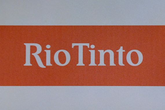 Logo of Rio Tinto. White letters on an orange background.