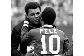 In this Oct 1, 1977 photo, Pele embraces US boxer Muhammad Ali