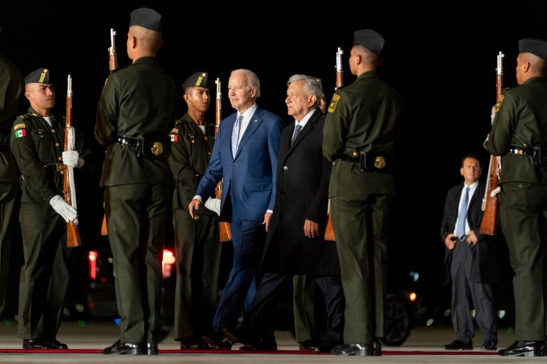 US President Joe Biden is greeted by his Mexican counterpart, Andres Manuel Lopez Obrador, as he arrives in Mexico on January 8, 2023