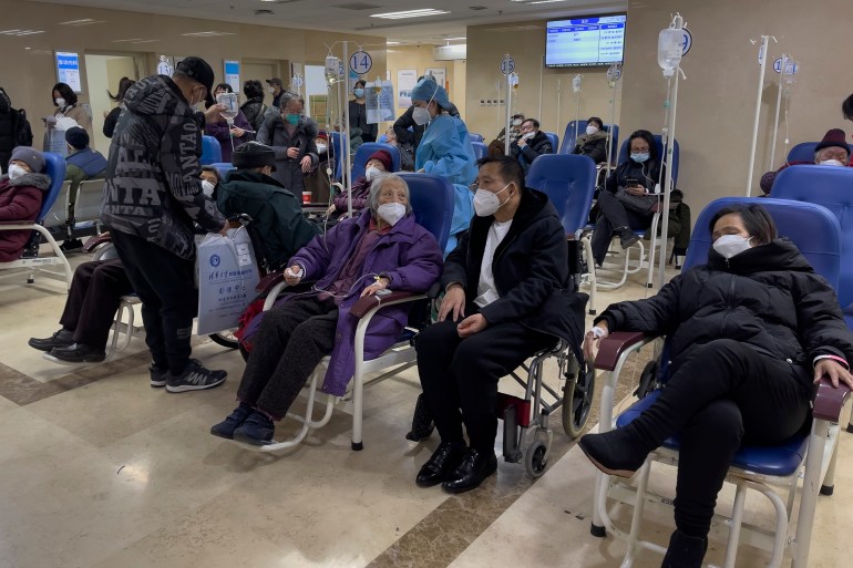 Patients receive intravenous drips in an emergency ward in Beijing, China.