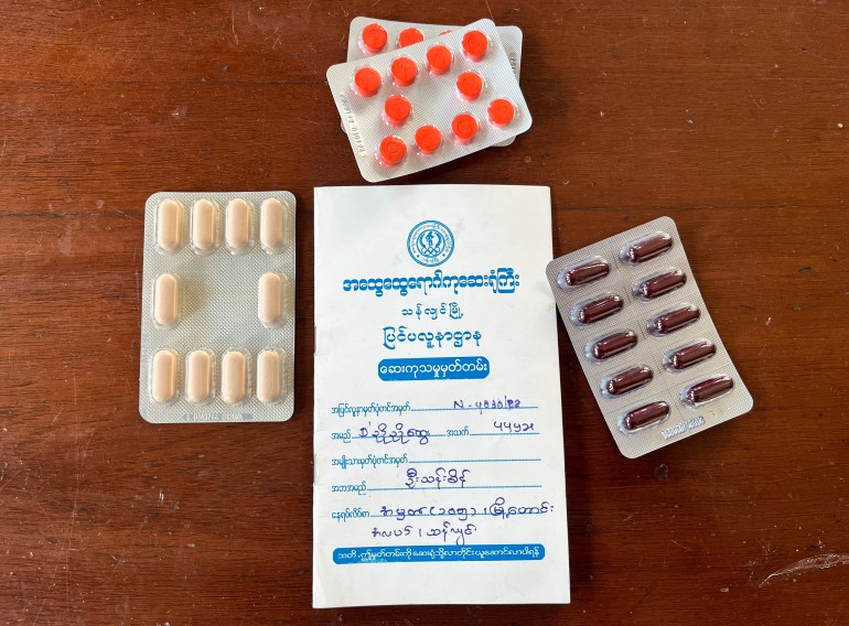 A photo of pills and a prescription.