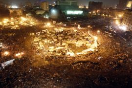 Protesters celebrate in Tahrir Square after the announcement of Mubarak's resignation