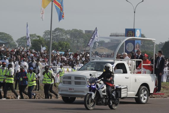 Pope Francis arrives on the popemobile for the mass at the N'Dolo Airport in Kinshasa