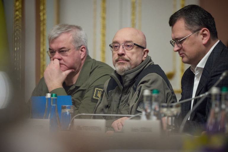 This handout picture taken and released by the Ukrainian Presidential Press Service on February 3, 2023, shows Ukrainian Defense Minister Oleksiy Reznikov (C) and Ukrainian Foreign Minister Dmytro Kuleba (R) attending a working session during an EU-Ukraine summit in Kyiv. . (Photo by Handout / Ukrainian presidential press-service / AFP) / RESTRICTED TO EDITORIAL USE - MANDATORY CREDIT "
