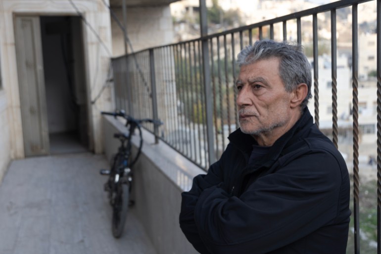 Resident of the building in Silwan, Arafat al-Nabi, 57, told Al Jazeera he believes Israel wants Palestinians in Jerusalem “to give up and move to the West Bank.” [File: Faiz Abu Rmeleh/Al Jazeera]