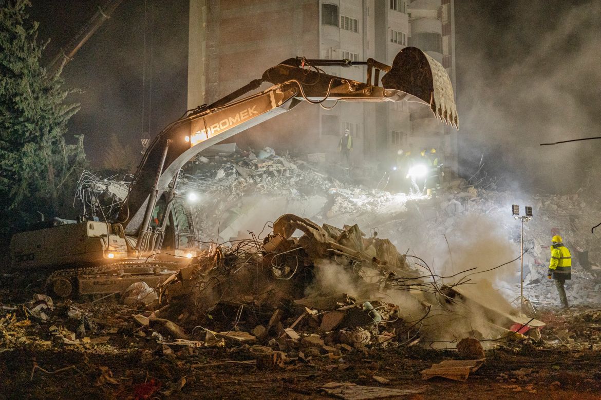 A crane excavates amid the rubbles, a sign that search teams believe there might no longer be survivors beneath the pile of debris. 