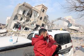 epa10458523 House owners react as emergency personnel work at the site of a collapsed building following a powerful earthquake in the city of Kahramanmaras, Turkey, 10 February 2023. More than 21,000 people have died and thousands more are injured after two major earthquakes struck southern Turkey and northern Syria on 06 February. Authorities fear the death toll will keep climbing as rescuers look for survivors across the region. EPA-EFE/ABIR SULTAN