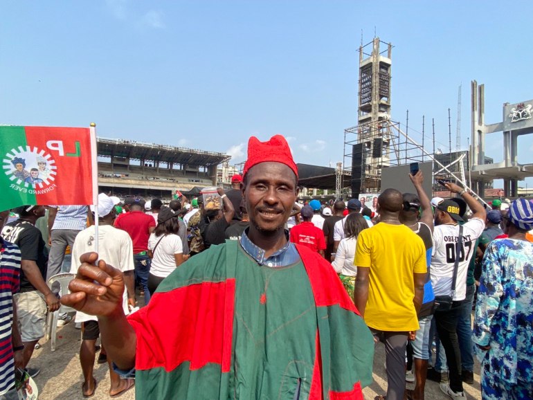 Alhaji Kabiru Zaria, a supporter of the Labour Party, stands at a rally in Lagos on February 11, 2023 [Pelumi Salako/Al Jazeera]