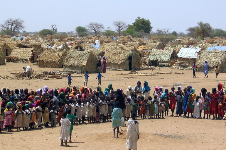 Sudanese refugees at the Kakma refugee camp in an arid area in Sudan's northern Darfur province