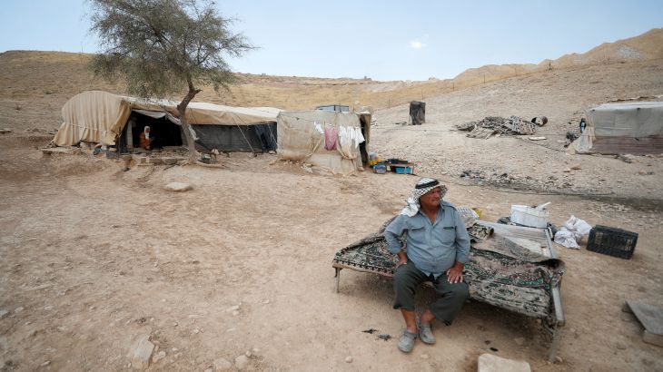 A Palestinian Bedouin sits near his tent near Jericho in the Israeli-occupied West Bank June 27, 2022