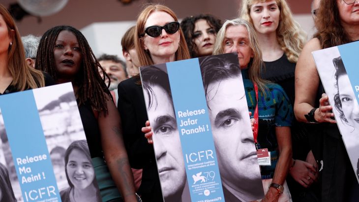 Julianne Moore takes part in a flash mob to protest over the arrest of Iranian director Jafar Panahi and in solidarity of Iranian filmmaker.
