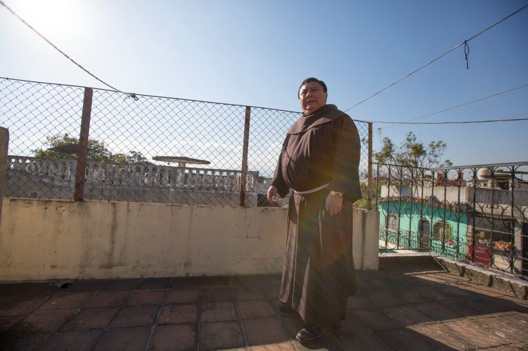 Friar German Tax stands on the roof of the migrant shelter in Colonia Mezquital on February 14
