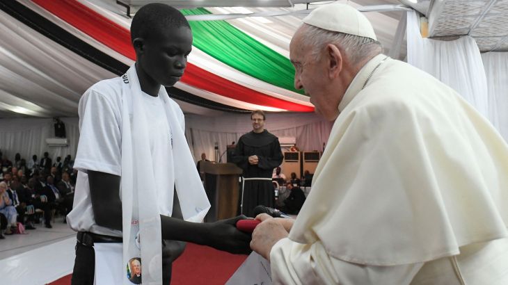 Pope Francis meets displaced child