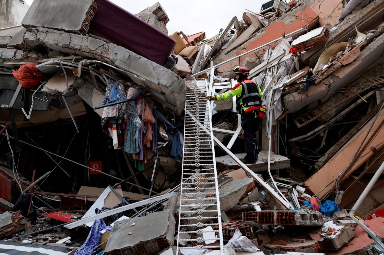 A rescuer of International Search and Rescue (ISAR) works, following an earthquake, in Kirikhan, Hatay Province, Turkey.